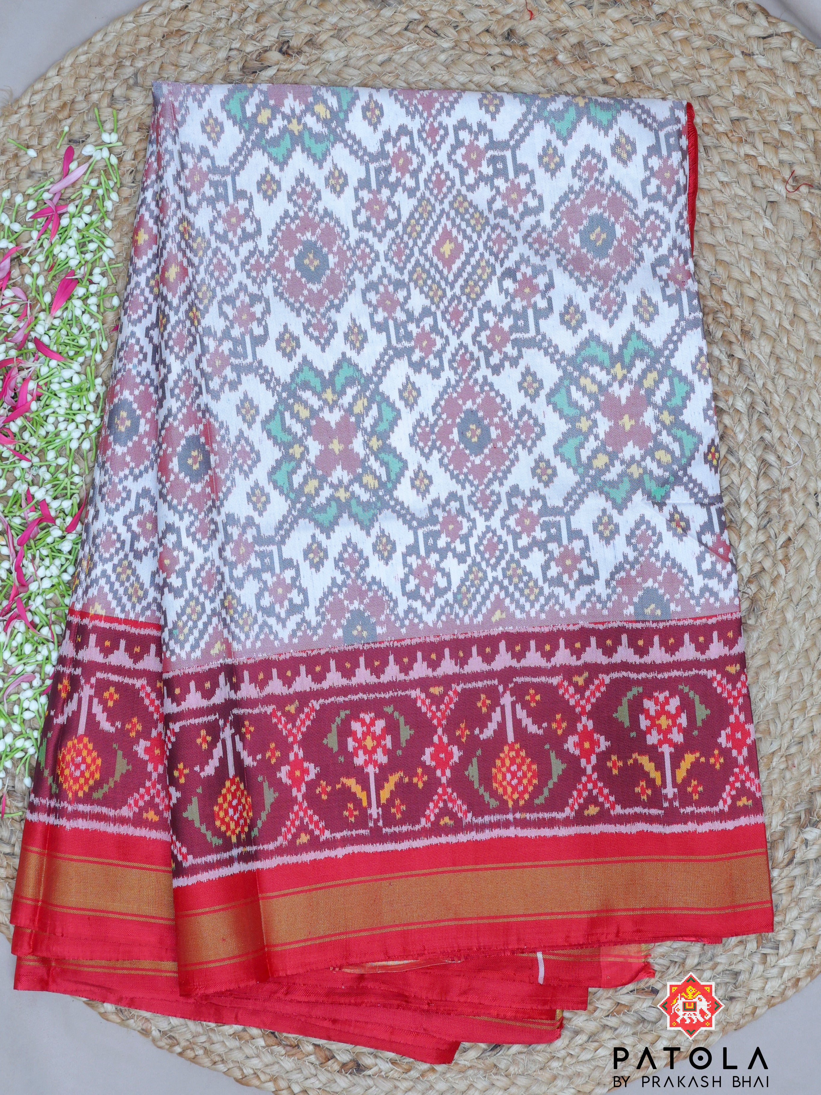 White Navratna Design Semi Double Ikat Patola Saree