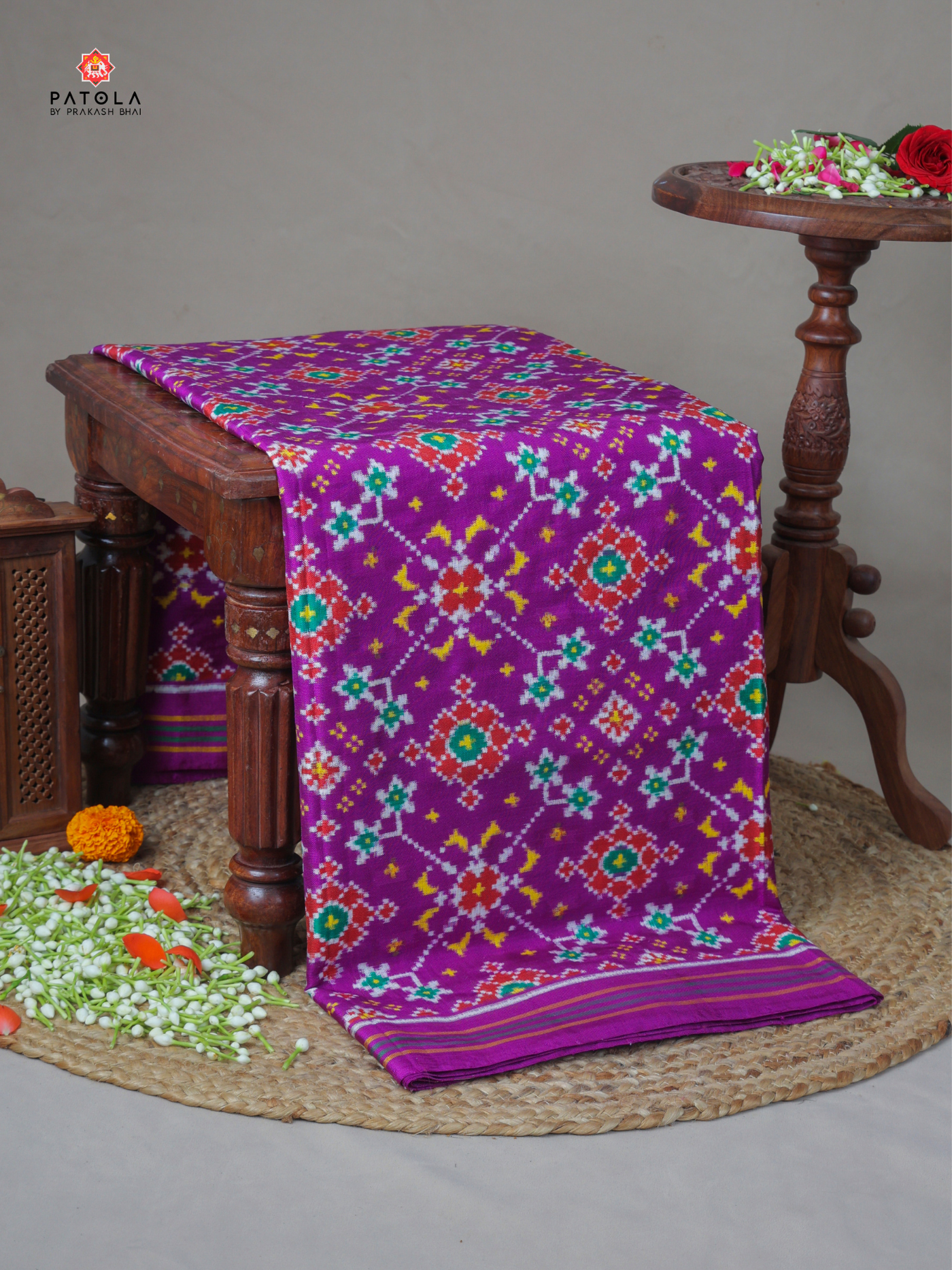 Purple  navratna design pure double ikat patola saree