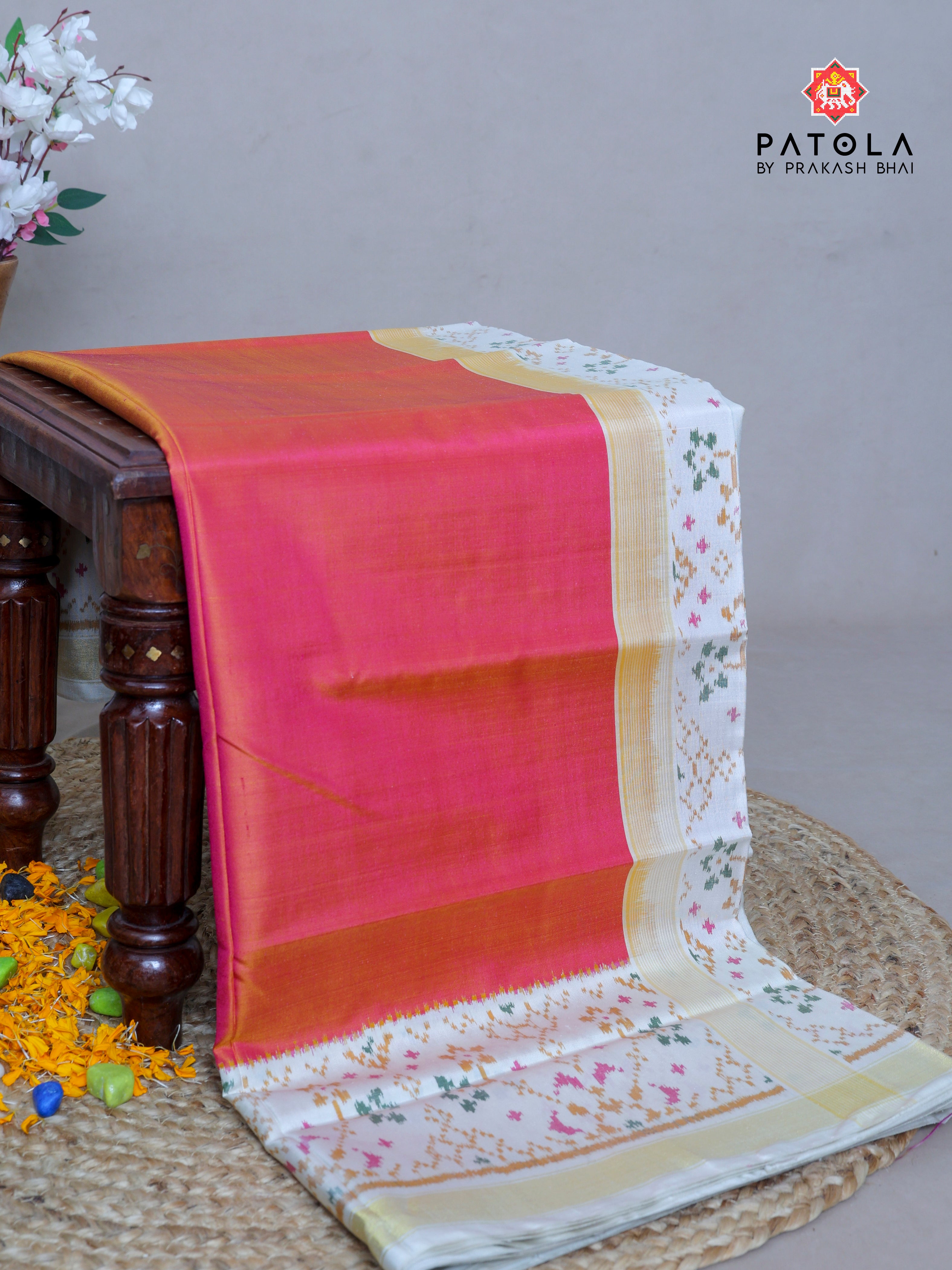 Plain Peach With Navratna Border Single Ikat Patola Saree