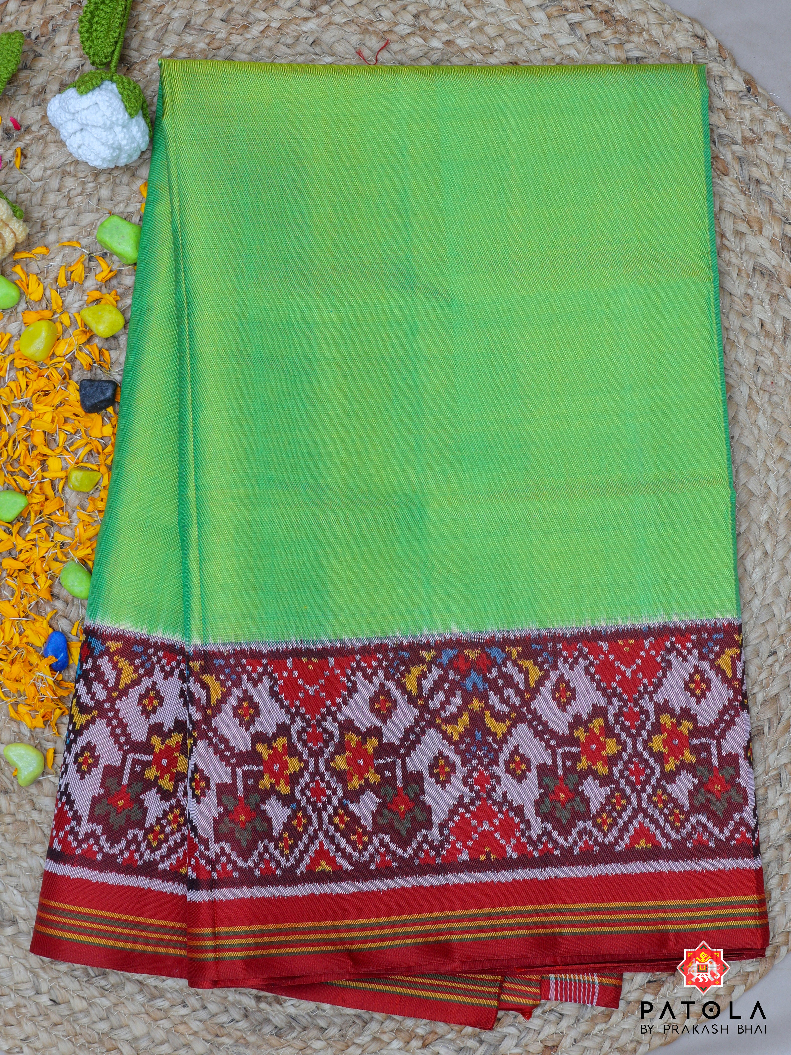 Plain Pista Green With Navratna Border Semi Double Ikat Patola Saree