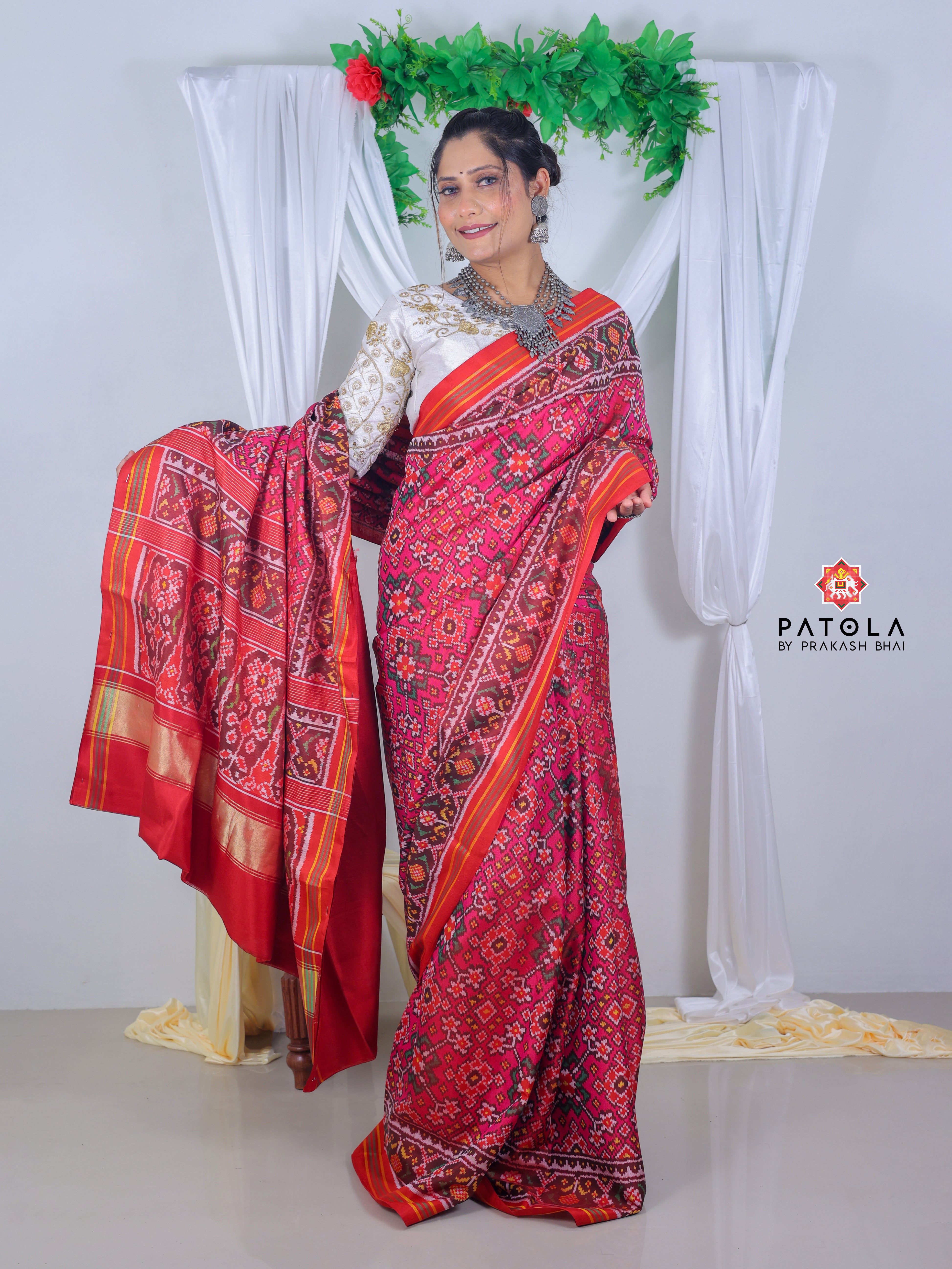 Pink Navratna Design With Ghughroo Border Semi Double Ikat Patola Saree