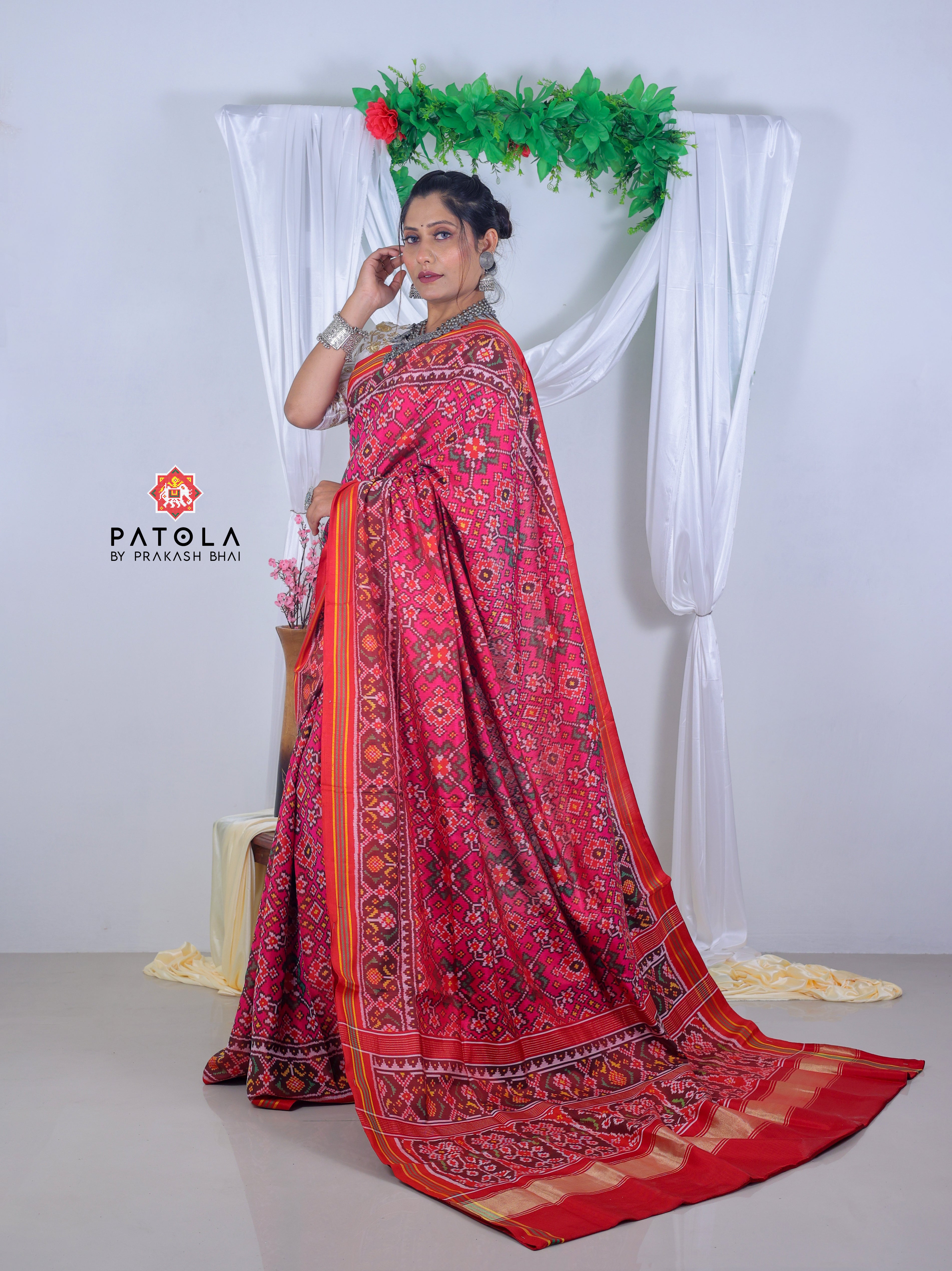 Pink Navratna Design With Ghughroo Border Semi Double Ikat Patola Saree