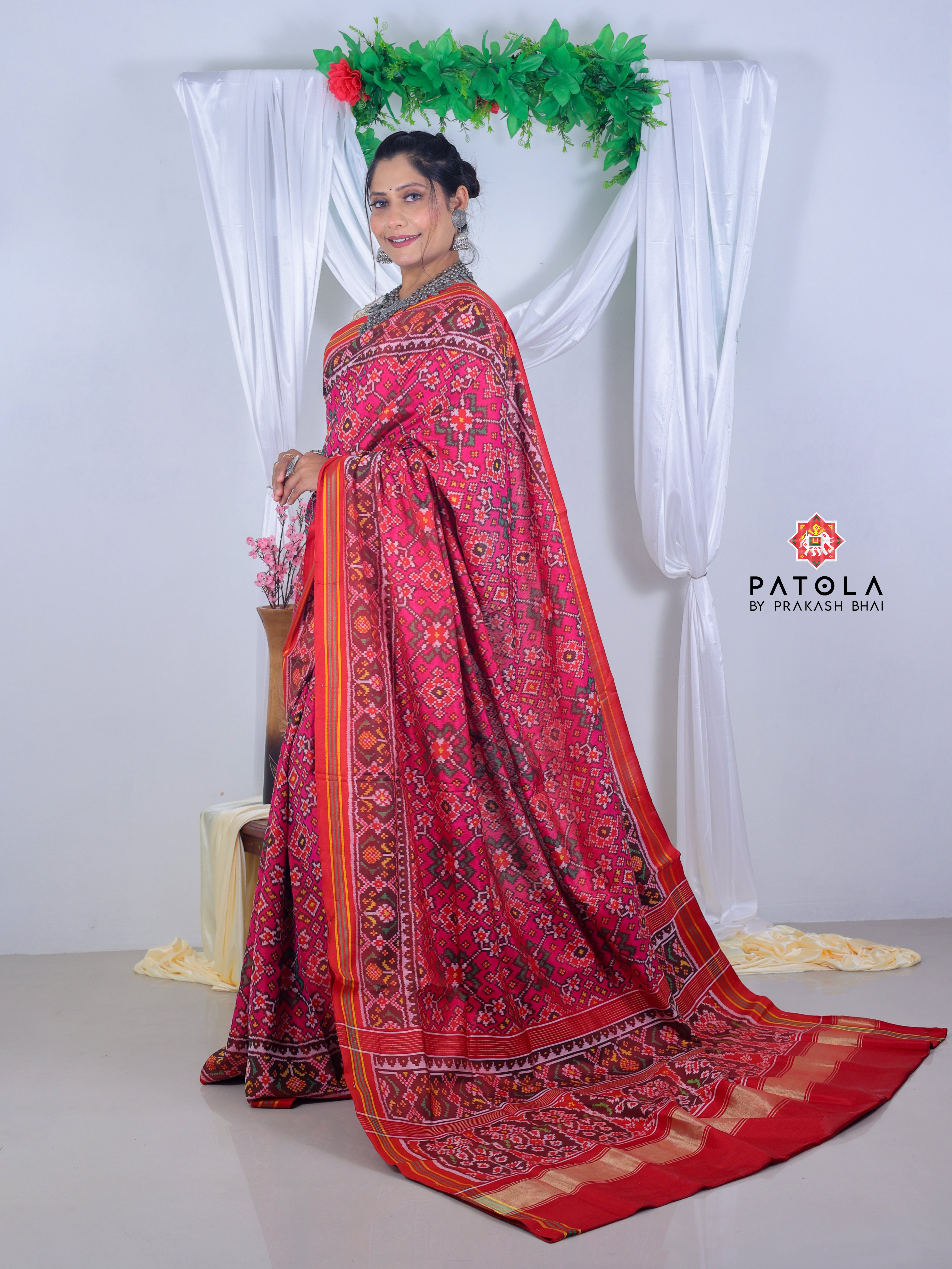 Pink Navratna Design With Ghughroo Border Semi Double Ikat Patola Saree