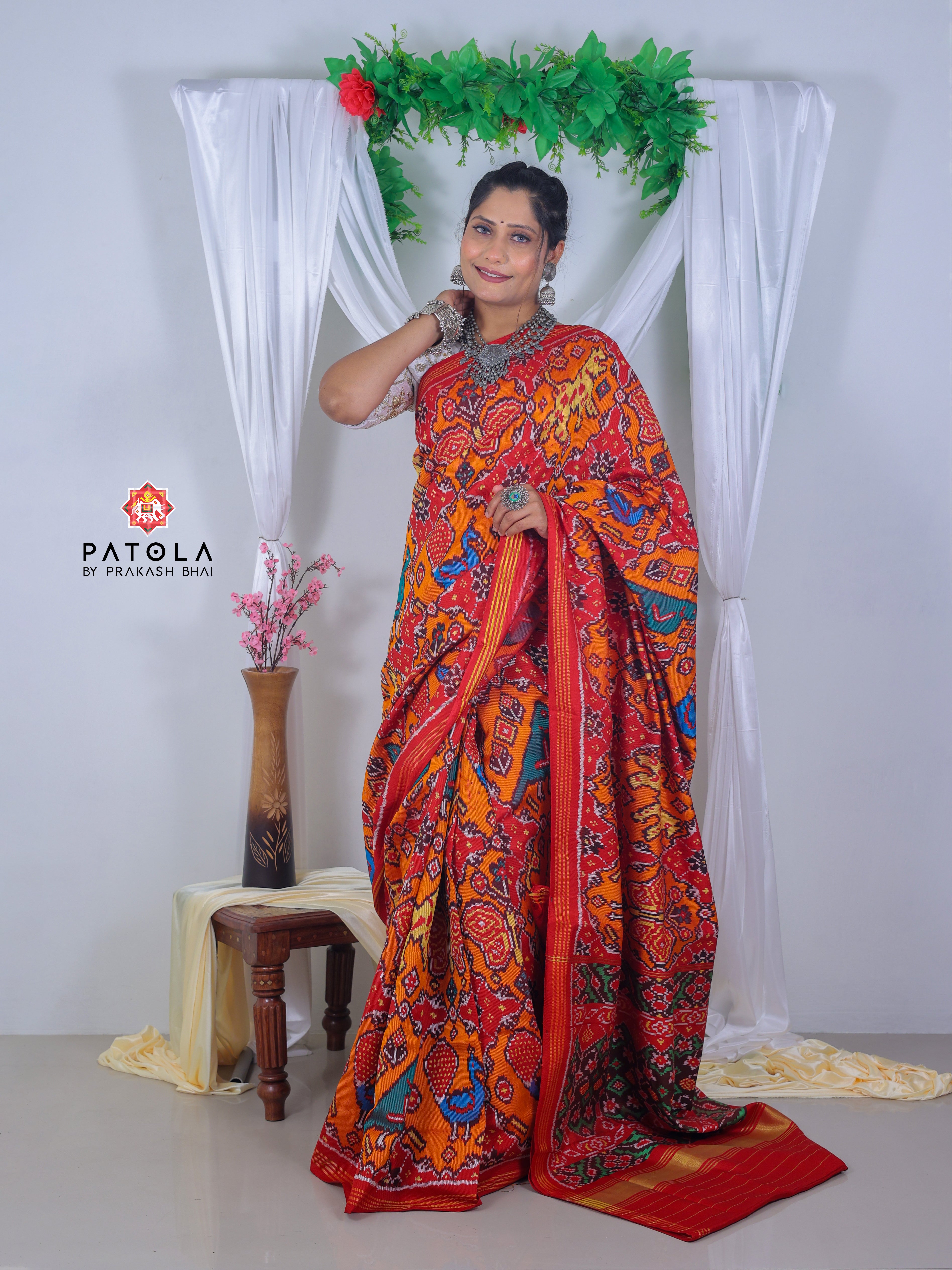 Orange Chhabdi With Figures Designer Twill Patola Saree