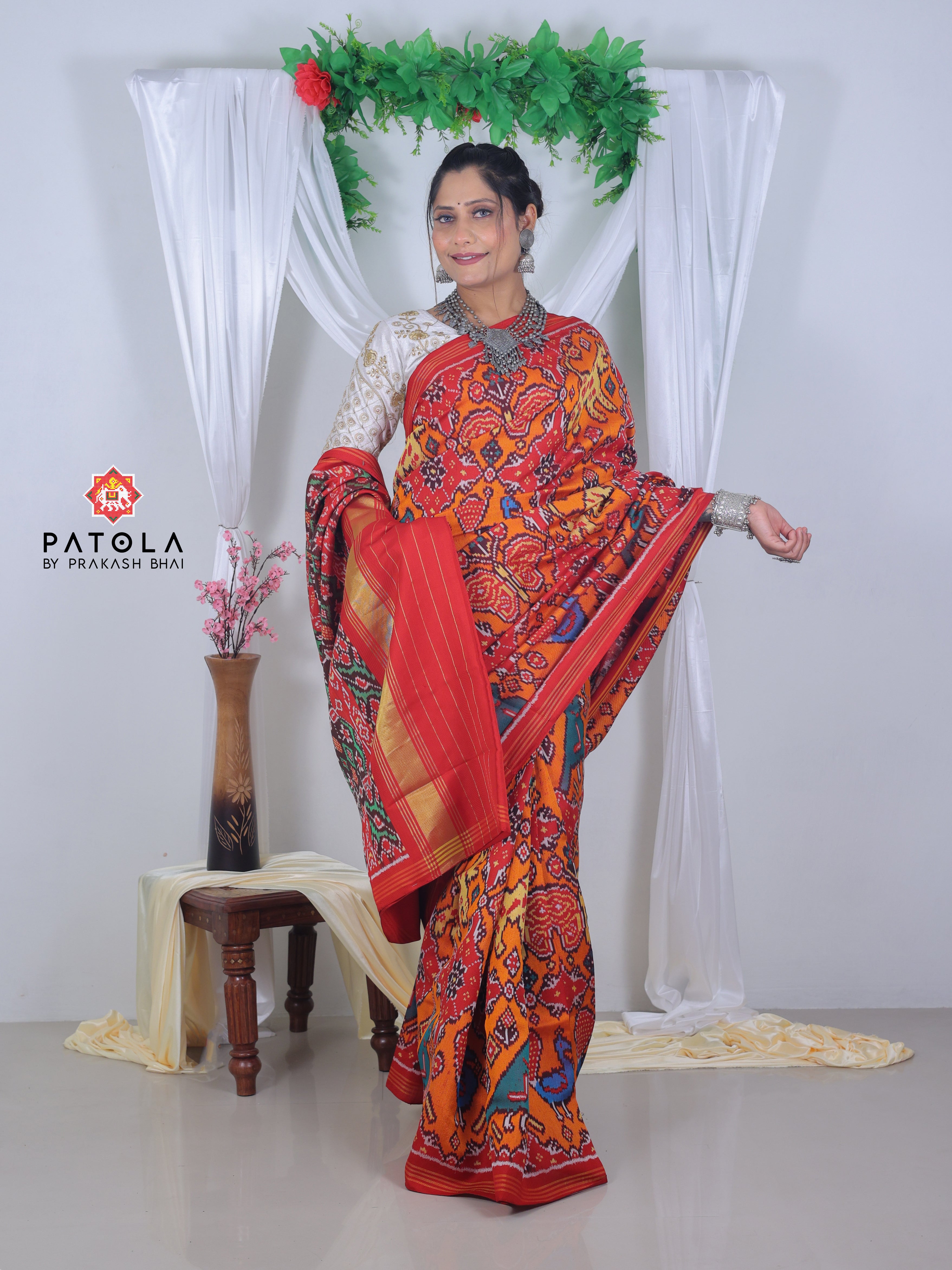 Orange Chhabdi With Figures Designer Twill Patola Saree