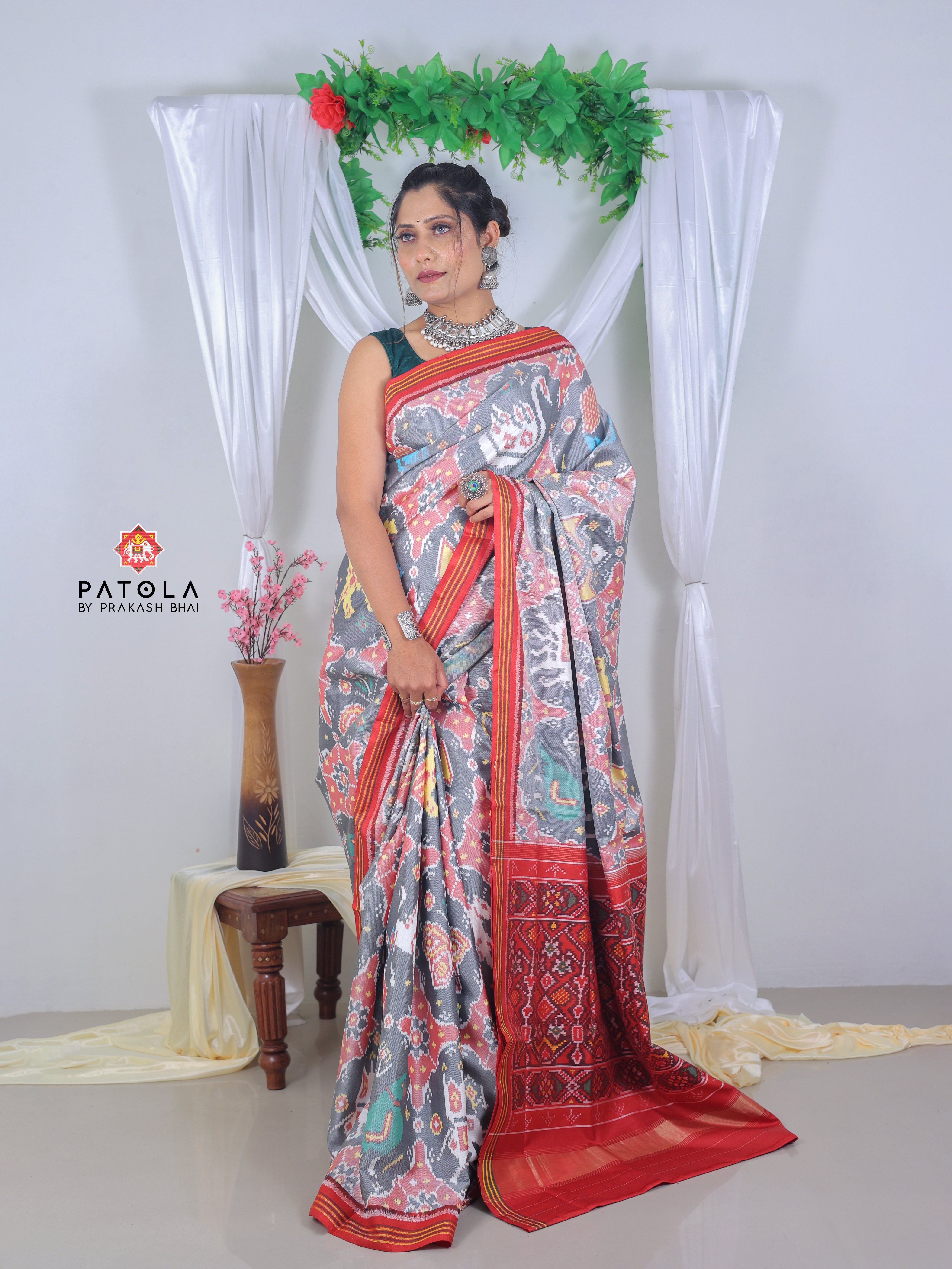 Figures With Gray Chhabdi Designer Semi Double Ikat Patola Saree