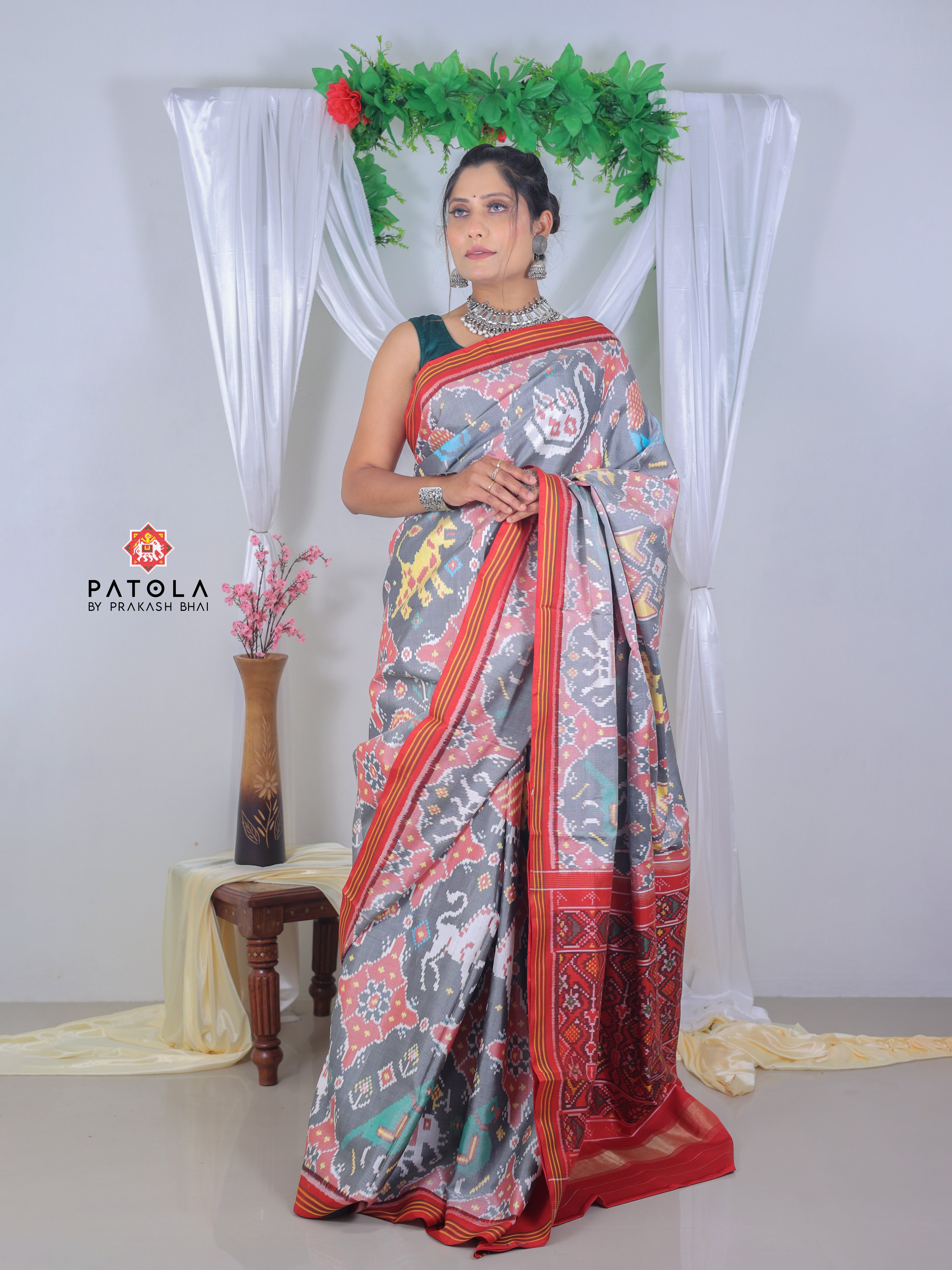 Figures With Gray Chhabdi Designer Semi Double Ikat Patola Saree