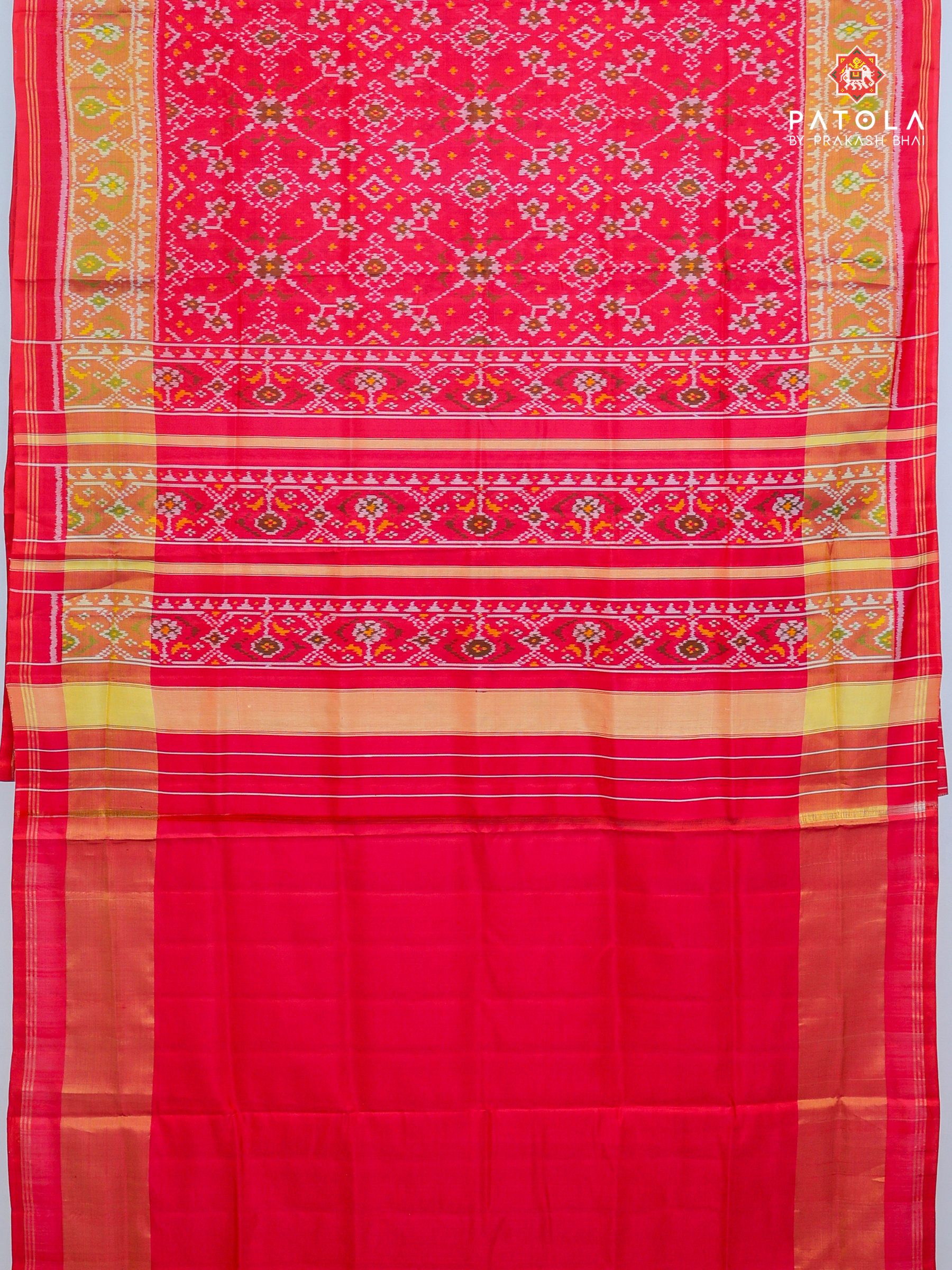 Navratna design with ghughroo border single ikat patola saree
